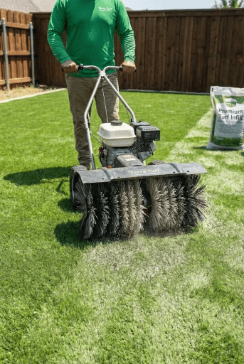 Artificial grass power brushing process